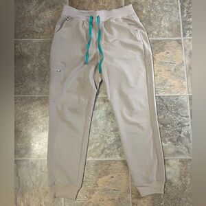 Stylish Beige Jogger Pants with Teal Accents